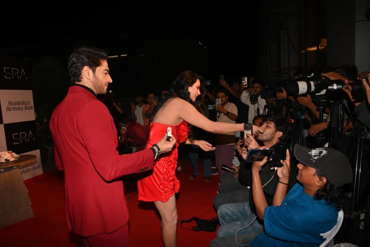 Akanksha celebrated the day with paps and even feeded them cake. She was seen in a jovial mood while Gaurav adored her.